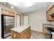 Kitchen features stainless steel appliances, island and neutral color cabinets at 6354 Cotton Bay N Dr, Indianapolis, IN 46254