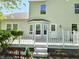 A backyard deck provides access to the home and beautiful outdoor area at 6369 Kelsey Dr, Indianapolis, IN 46268