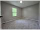 Neutral bedroom with gray walls and carpet at 6369 Kelsey Dr, Indianapolis, IN 46268