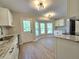 Modern kitchen with granite countertops, stainless appliances, and bright breakfast nook at 6369 Kelsey Dr, Indianapolis, IN 46268