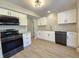 Modern kitchen with stainless appliances, granite countertops, and ample counter space at 6369 Kelsey Dr, Indianapolis, IN 46268