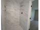 Tiled shower with built-in shelves and rainfall shower head at 6369 Kelsey Dr, Indianapolis, IN 46268