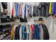 Organized closet with hanging clothes, shoes, and accessories, maximizing storage space at 6707 Greendale Ln, Indianapolis, IN 46241
