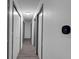 Hallway features wood-look floors, flush lighting, and a smart thermostat mounted to a freshly painted wall at 6707 Greendale Ln, Indianapolis, IN 46241
