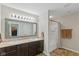 Bathroom with a double sink vanity, framed mirror, and shower and tub combination at 695 Bobtail Dr, Greenfield, IN 46140