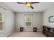 Neutral bedroom with large window offering natural light and plush carpeting at 695 Bobtail Dr, Greenfield, IN 46140