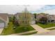 Gorgeous two-story house with a landscaped yard, and an attached garage at 695 Bobtail Dr, Greenfield, IN 46140