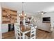 Open-concept space with dining area, kitchen and living room at 695 Bobtail Dr, Greenfield, IN 46140