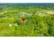 Overhead view of the property nestled within a verdant, tree-filled environment at 6968 S 300 W, Trafalgar, IN 46181