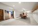 Finished basement featuring a carpeted floor, stairs to the upper level, and a pool table at 6968 S 300 W, Trafalgar, IN 46181