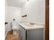 Bathroom with a vanity, toilet, and a faux plant at 6968 S 300 W, Trafalgar, IN 46181