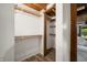 Walk-in closet with custom shelving and a view into the bedroom at 6968 S 300 W, Trafalgar, IN 46181