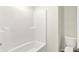 This bathroom features a shower and bathtub combination and toilet at 7132 Sterling Way, Brownsburg, IN 46112
