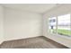 This bedroom has carpet and a window with a view of the outdoors at 7132 Sterling Way, Brownsburg, IN 46112