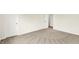 Bedroom featuring neutral carpet, white walls, and an open doorway for easy access at 7132 Sterling Way, Brownsburg, IN 46112