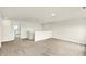 Bright open bonus room featuring neutral carpet and walls at 7132 Sterling Way, Brownsburg, IN 46112