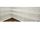 This walk-in closet features white wire shelving and wood flooring at 7132 Sterling Way, Brownsburg, IN 46112