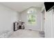 room featuring a large window and play area at 7606 Old Oakland Blvd E Dr, Indianapolis, IN 46236
