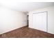 Bedroom featuring neutral carpet, closet, and white interior door at 7611 Misty Meadow Dr, Indianapolis, IN 46217