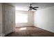 This bright bedroom includes carpet flooring and an abundance of natural light at 7611 Misty Meadow Dr, Indianapolis, IN 46217