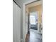 Well lit bathroom featuring modern wood floors and shower with a white waffle weave shower curtain at 8112 Joni Ave, Martinsville, IN 46151