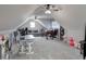Large bonus room featuring vaulted ceilings, neutral carpet and windows for natural light at 8112 Joni Ave, Martinsville, IN 46151