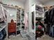 Well-organized walk-in closet with custom shelving and plenty of space for clothes and accessories at 8112 Joni Ave, Martinsville, IN 46151