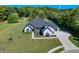 Beautiful home with manicured lawn, professional landscaping, and a curved driveway at 8112 Joni Ave, Martinsville, IN 46151