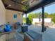 Inviting backyard patio featuring a gas fireplace, ample seating, and serene outdoor views at 8112 Joni Ave, Martinsville, IN 46151