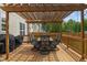 Back deck with pergola, offering a great space for relaxation and gatherings at 828 Breaside Ln, Greenwood, IN 46143