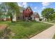 Charming two-story brick home with a well-manicured lawn and attached two car garage at 828 Breaside Ln, Greenwood, IN 46143