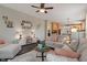 Relaxing living room highlighting comfortable seating, stylish decor, and an open connection to the kitchen at 828 Breaside Ln, Greenwood, IN 46143