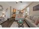 Inviting living room with plush seating, decorative accents, and an open view into the kitchen area at 828 Breaside Ln, Greenwood, IN 46143