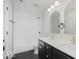This bathroom boasts a double sink vanity, modern fixtures, and a shower tub combination at 8300 Weaver Woods Pl, Fishers, IN 46038