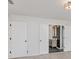 Bedroom area leading to a bathroom featuring modern fixtures and ample natural light at 8300 Weaver Woods Pl, Fishers, IN 46038