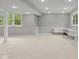 Finished basement with recessed lighting, neutral carpet and gray paint at 888 Westcreek Dr, Columbus, IN 47201