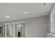 Spacious basement area with recessed lighting and access to a vanity at 888 Westcreek Dr, Columbus, IN 47201