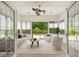 Bright sunroom decorated with stylish furniture and an exterior view at 888 Westcreek Dr, Columbus, IN 47201