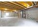 Spacious unfinished basement with utilities, exposed ceiling, and concrete floor at 932 Silverheels Dr, Westfield, IN 46074