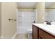 Bathroom with a tiled floor, shower-tub, and single sink at 932 Silverheels Dr, Westfield, IN 46074