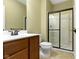 Bathroom featuring vanity, toilet, and shower with glass door at 932 Silverheels Dr, Westfield, IN 46074
