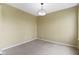 Clean bedroom with neutral carpet, centered light fixture, and a cozy atmosphere at 932 Silverheels Dr, Westfield, IN 46074