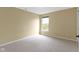 A carpeted bedroom featuring a window at 932 Silverheels Dr, Westfield, IN 46074