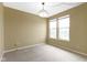 Well-lit bedroom featuring neutral carpet, light fixture, and natural light at 932 Silverheels Dr, Westfield, IN 46074