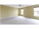 Large primary bedroom featuring neutral walls, carpet, and dual windows at 932 Silverheels Dr, Westfield, IN 46074