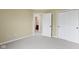 Bedroom with carpet, closet, and door leading to bathroom at 932 Silverheels Dr, Westfield, IN 46074
