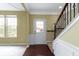 Entryway with wood floors, staircase, and white trim at 932 Silverheels Dr, Westfield, IN 46074