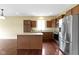 Stylish kitchen with stainless steel appliances, center island and modern lighting, great for entertaining and cooking at 932 Silverheels Dr, Westfield, IN 46074