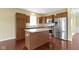 Well-lit kitchen featuring modern appliances, a center island, and plenty of counter space for cooking and prep at 932 Silverheels Dr, Westfield, IN 46074