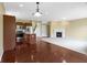 Spacious living room featuring a fireplace, wood floors, and open layout, perfect for entertaining at 932 Silverheels Dr, Westfield, IN 46074